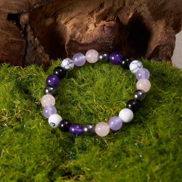 Pulsera de cuentas de hematita, obsidiana, amatista y cuarzo rosa de Olivenorma 