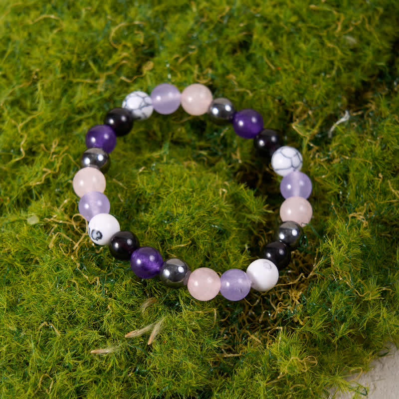 Pulsera de cuentas de hematita, obsidiana, amatista y cuarzo rosa de Olivenorma 