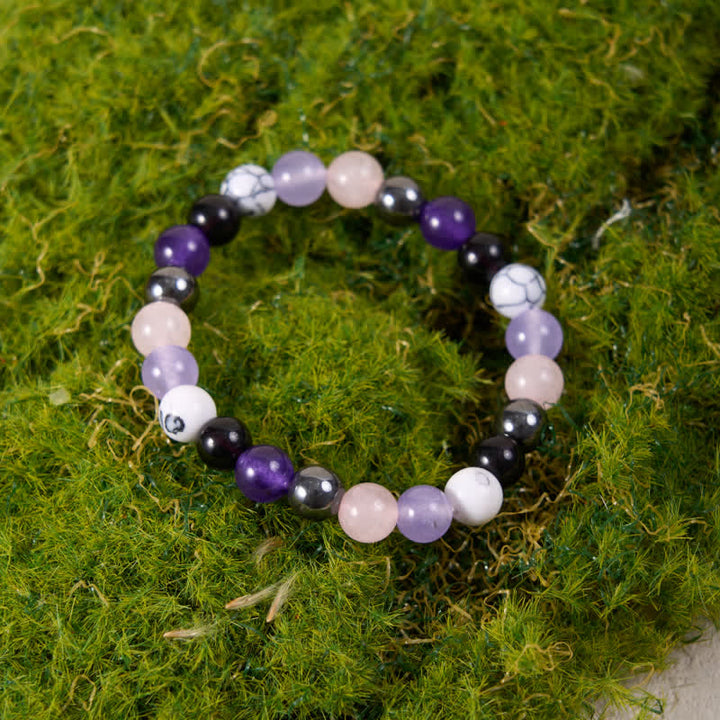 Pulsera de cuentas de hematita, obsidiana, amatista y cuarzo rosa de Olivenorma 