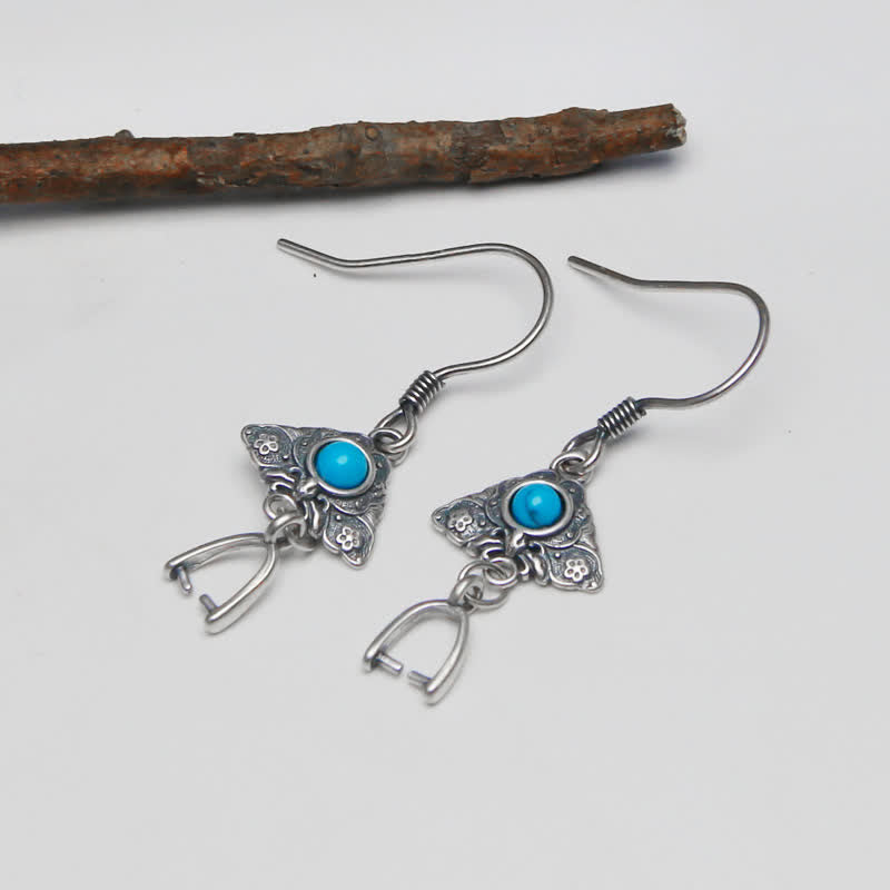 Pendientes colgantes de mariposa de estilo étnico en plata 925 de Olivenorma