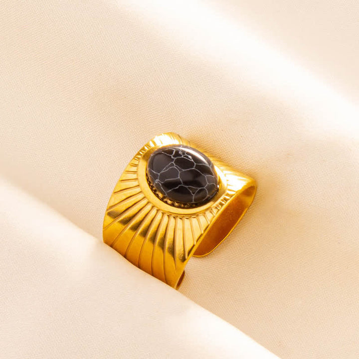 Anillo ancho ajustable con piedra natural ovalada con incrustaciones de Olivenorma 