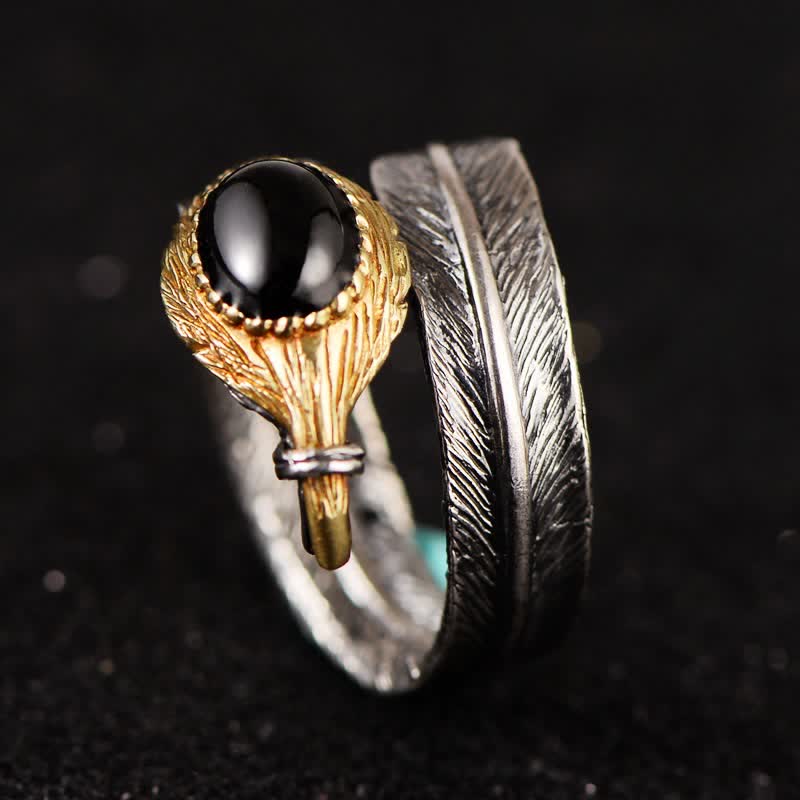 Anillo abierto con forma de pluma curvada en plata S925 de Olivenorma