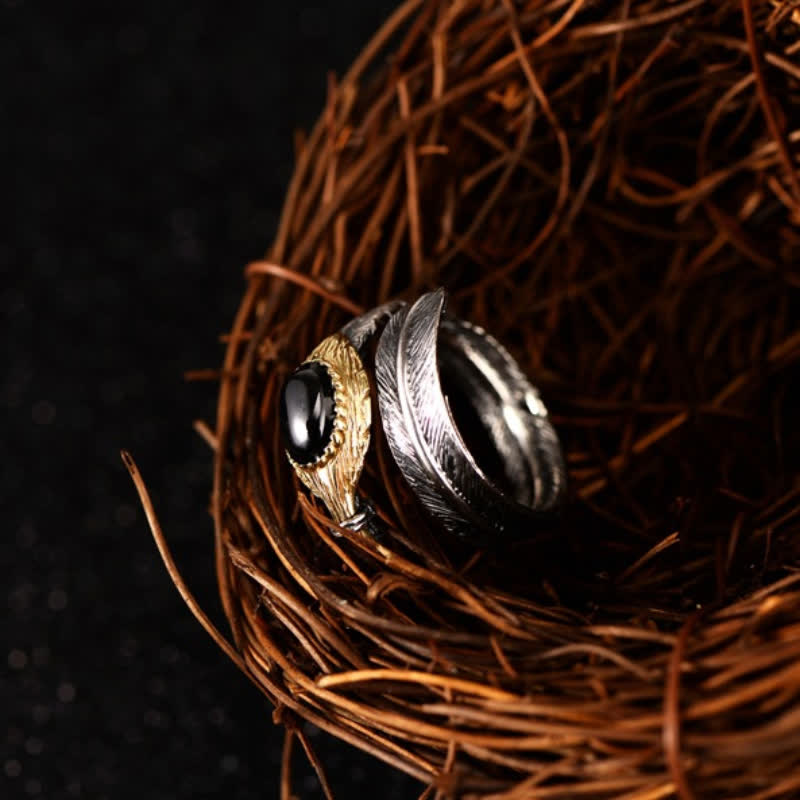 Anillo abierto con forma de pluma curvada en plata S925 de Olivenorma