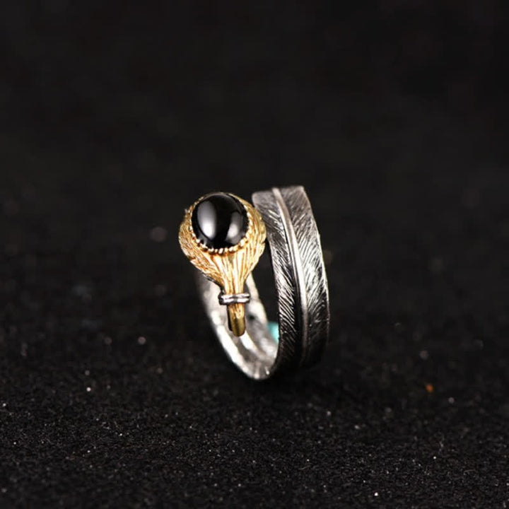 Anillo abierto con forma de pluma curvada en plata S925 de Olivenorma