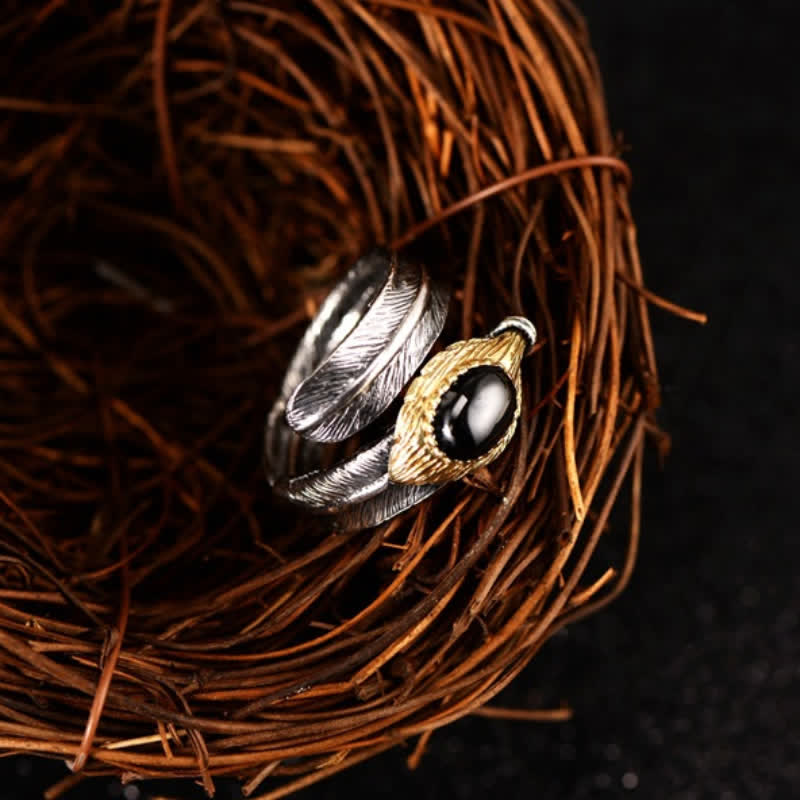 Anillo abierto con forma de pluma curvada en plata S925 de Olivenorma