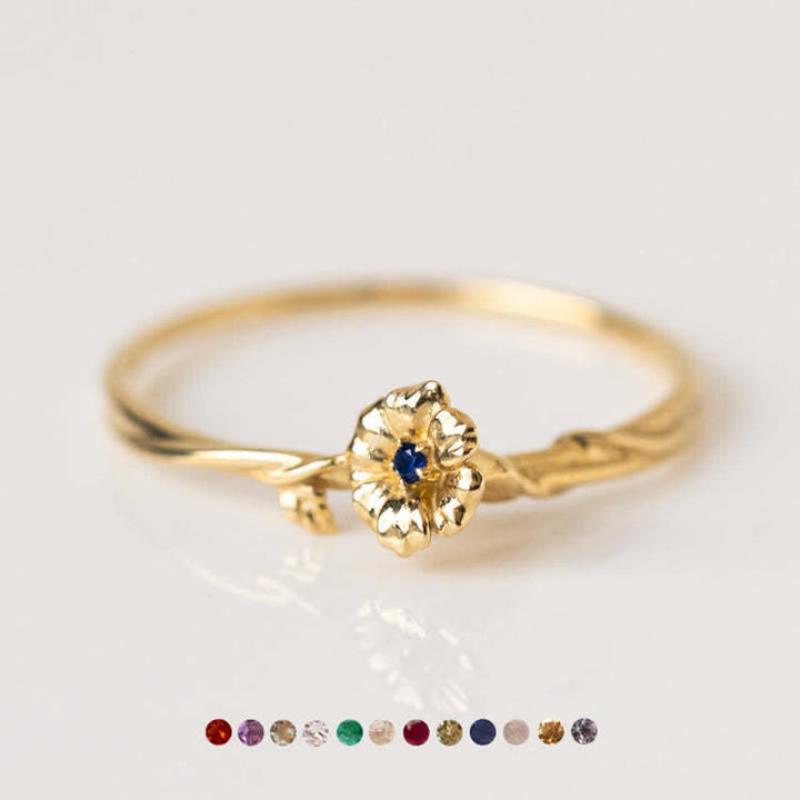 Anillo de oro con flor de nacimiento y delicado diseño de Olivenorma