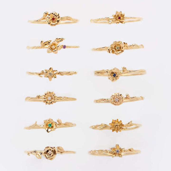 Anillo de oro con flor de nacimiento y delicado diseño de Olivenorma