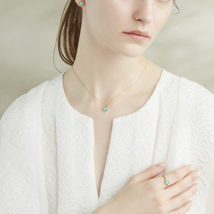 Conjunto de joyería con collar, pendientes y anillo de aguamarina natural de Olivenorma 
