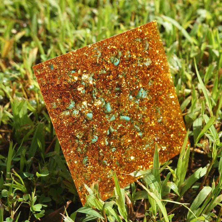 Pirámide de orgón de Buda con peridoto turquesa y ojo de tigre de Olivenorma
