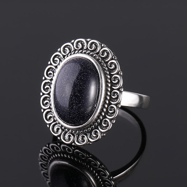 Anillo de piedra natural ovalada con forma de girasol tallado de Olivenorma