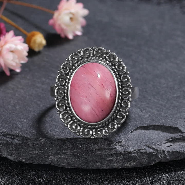 Anillo de piedra natural ovalada con forma de girasol tallado de Olivenorma