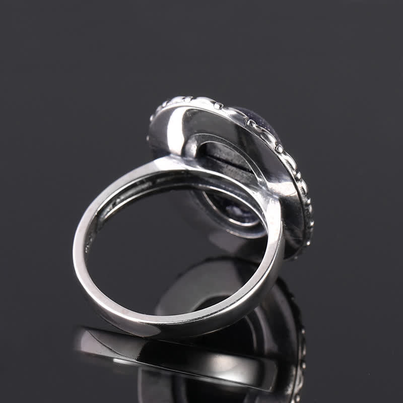 Anillo de piedra natural ovalada con forma de girasol tallado de Olivenorma