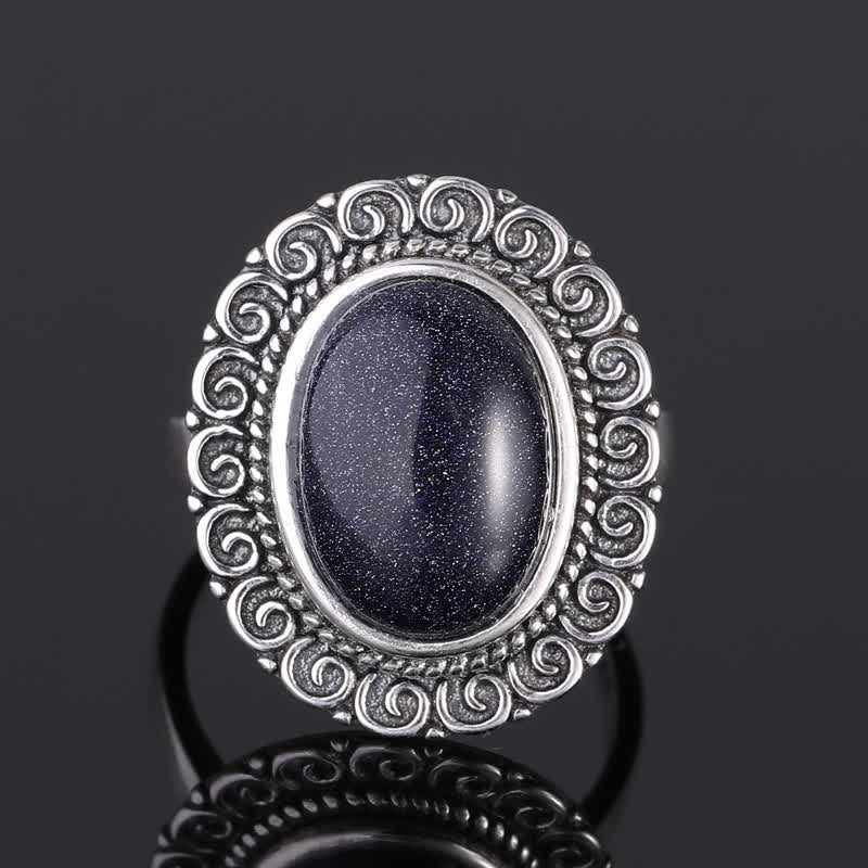 Anillo de piedra natural ovalada con forma de girasol tallado de Olivenorma