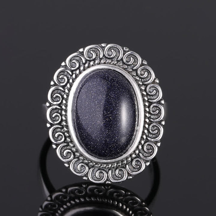 Anillo de piedra natural ovalada con forma de girasol tallado de Olivenorma