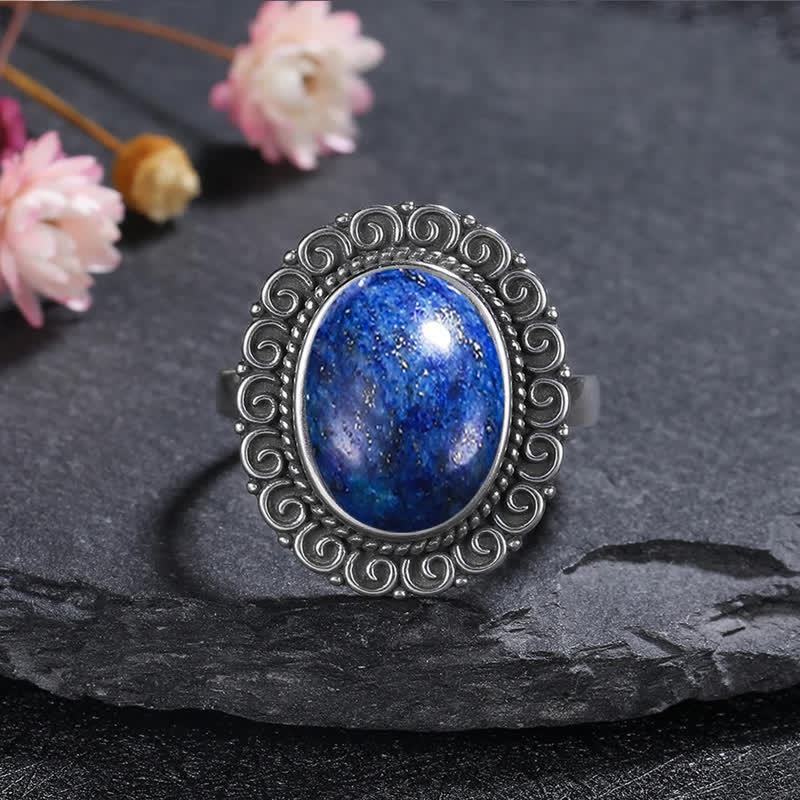 Anillo de piedra natural ovalada con forma de girasol tallado de Olivenorma
