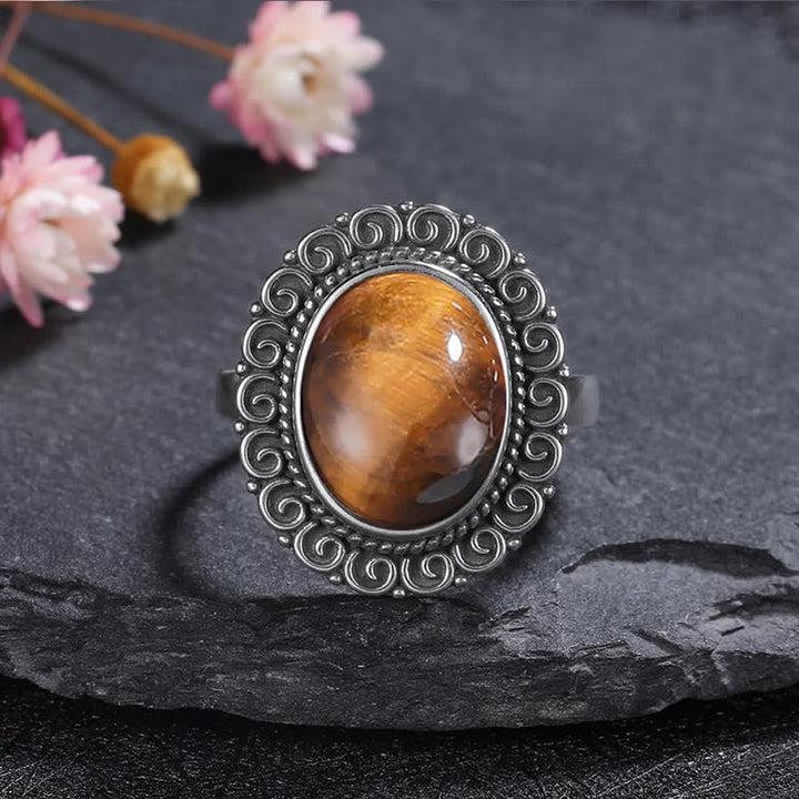 Anillo de piedra natural ovalada con forma de girasol tallado de Olivenorma