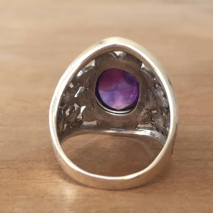 Anillo de flor hueca tallada con amatista ovalada natural de Olivenorma