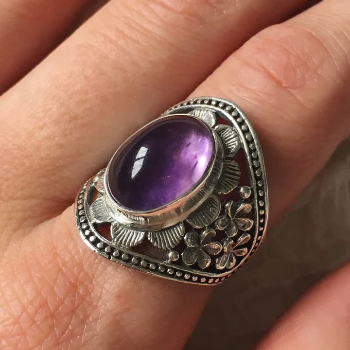 Anillo de flor hueca tallada con amatista ovalada natural de Olivenorma