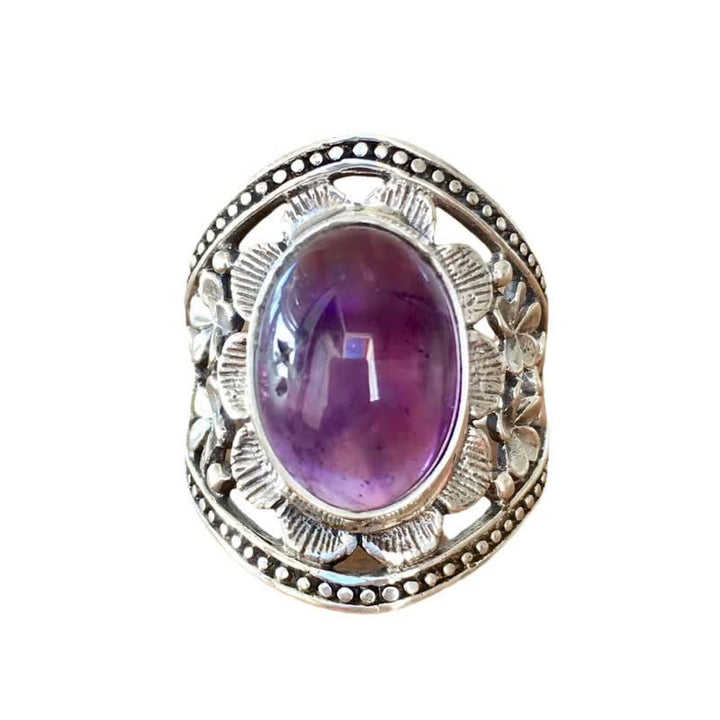 Anillo de flor hueca tallada con amatista ovalada natural de Olivenorma
