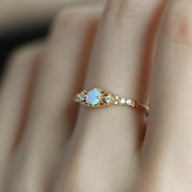 Anillo retro europeo de ópalo y circonita de Olivenorma