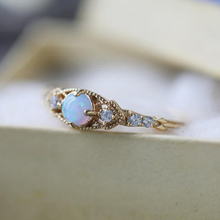 Anillo retro europeo de ópalo y circonita de Olivenorma