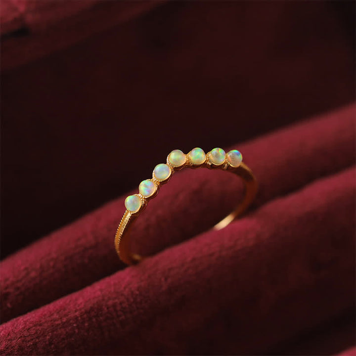 Anillo de doble capa con corona ondulada de ópalo natural de Olivenorma