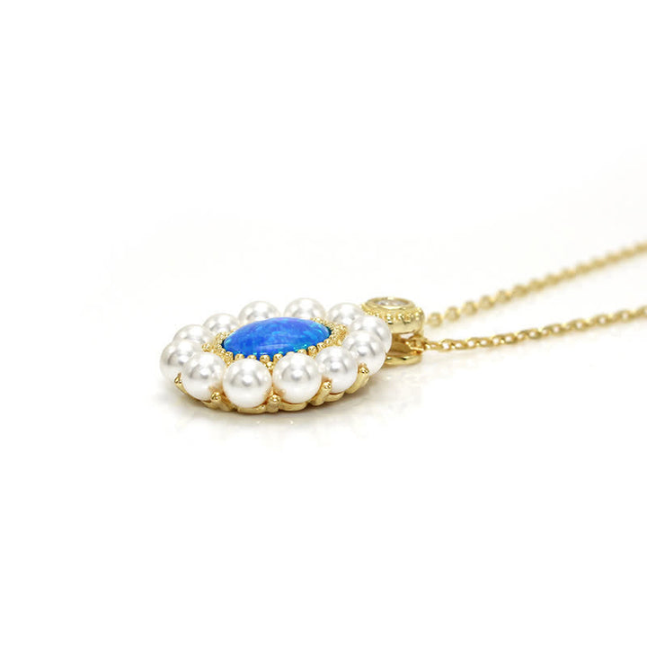 Conjunto de joyas con colgante de girasol y perla de agua dulce con ópalo azul de Olivenorma