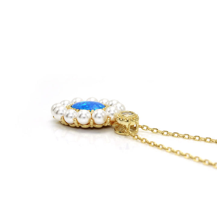 Conjunto de joyas con colgante de girasol y perla de agua dulce con ópalo azul de Olivenorma