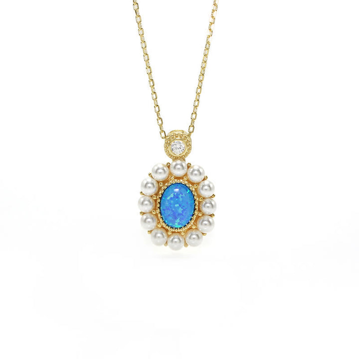 Conjunto de joyas con colgante de girasol y perla de agua dulce con ópalo azul de Olivenorma