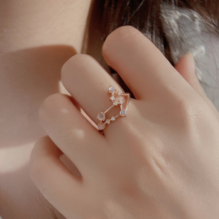 Anillo con símbolo del zodiaco de piedra lunar natural de Olivenorma