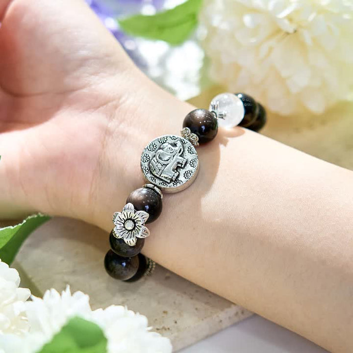 Pulsera con colgante de elefante de metal con cuentas de obsidiana plateada de Olivenorma