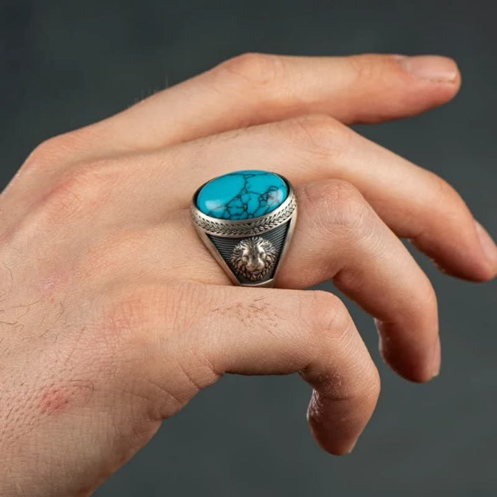 Anillo Olivenorma con león alado turquesa ovalado para hombre