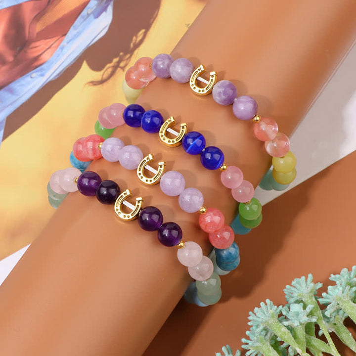 Pulsera de cuentas con accesorio de herradura de metal y piedra natural de Olivenorma 