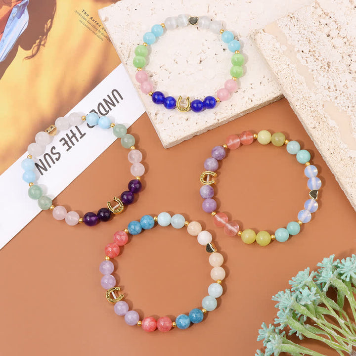 Pulsera de cuentas con accesorio de herradura de metal y piedra natural de Olivenorma 