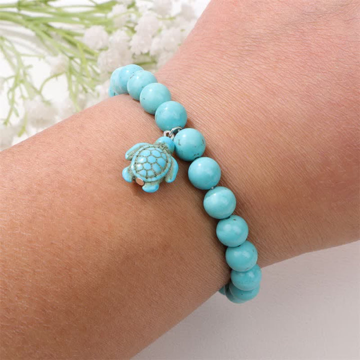 Pulsera con colgante de tortuga turquesa y piedra natural de Olivenorma 