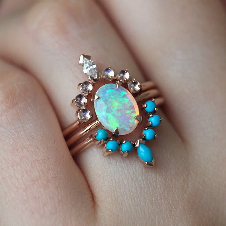 Juego de anillos con circonitas turquesas y opalita de Olivenorma