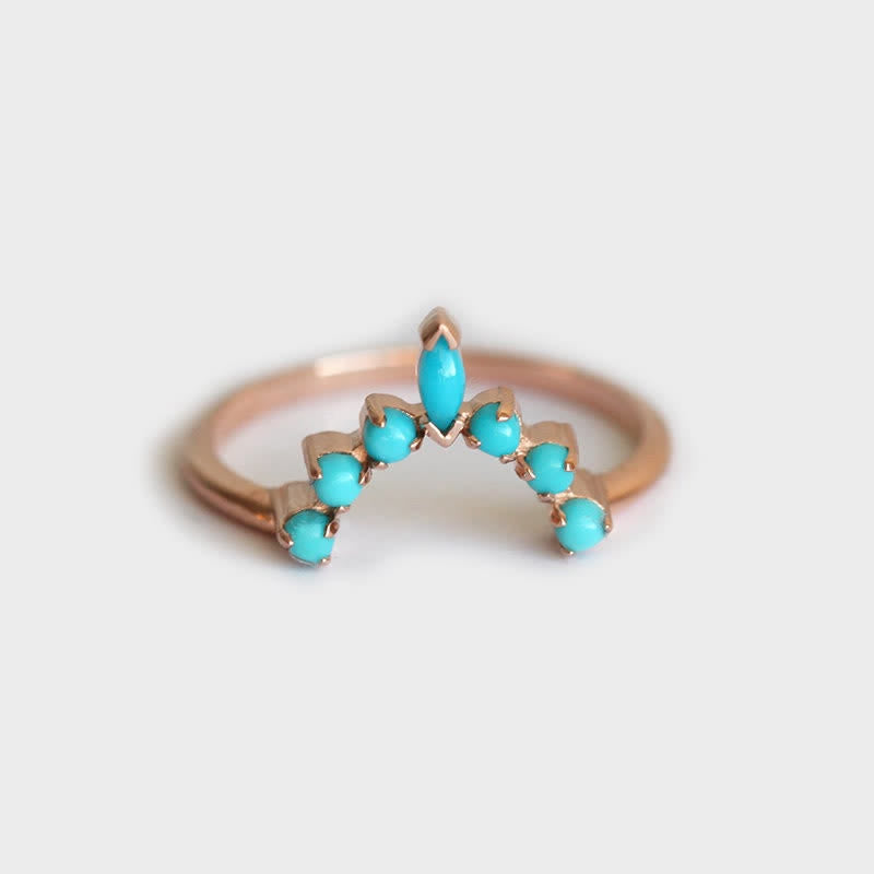Juego de anillos con circonitas turquesas y opalita de Olivenorma