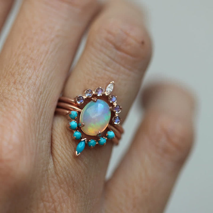 Juego de anillos con circonitas turquesas y opalita de Olivenorma