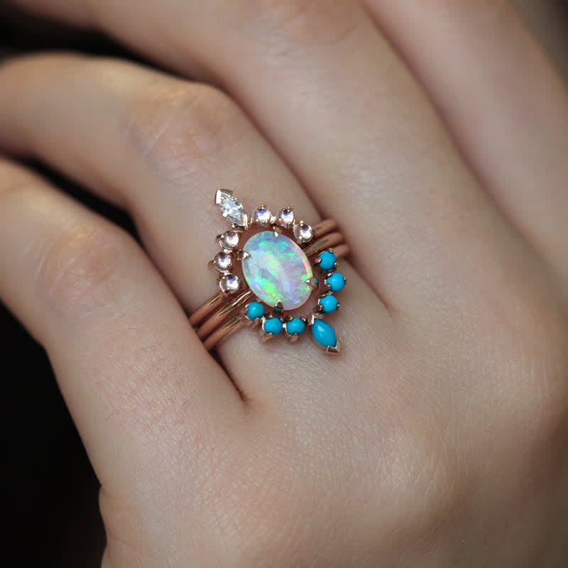 Juego de anillos con circonitas turquesas y opalita de Olivenorma