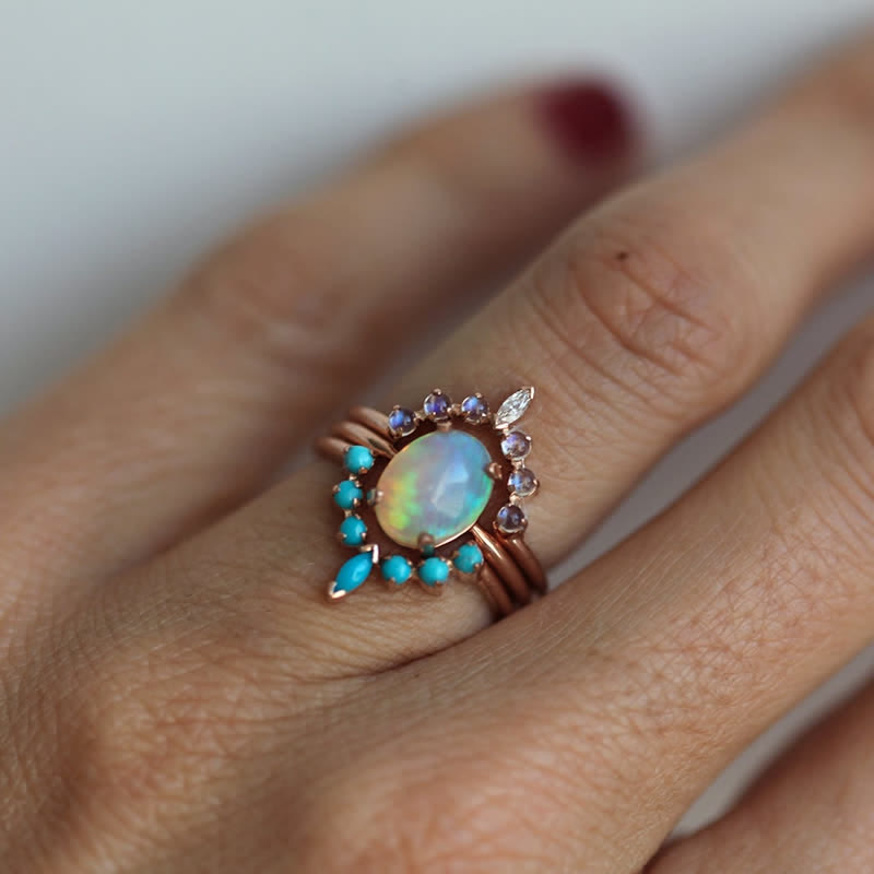 Juego de anillos con circonitas turquesas y opalita de Olivenorma