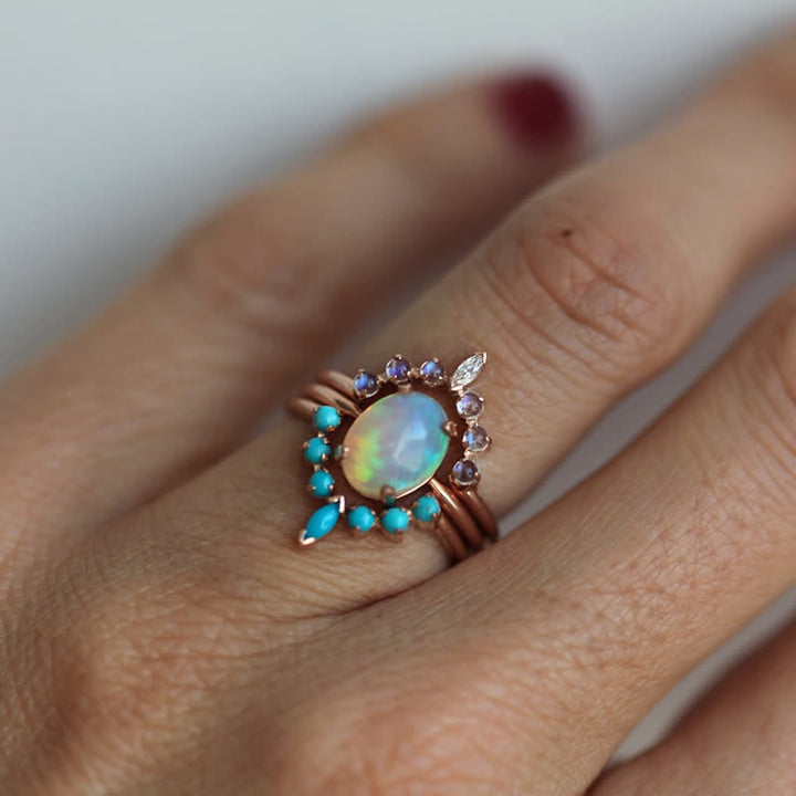 Juego de anillos con circonitas turquesas y opalita de Olivenorma