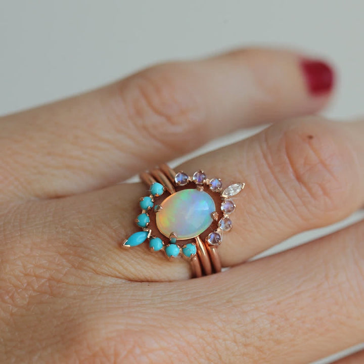 Juego de anillos con circonitas turquesas y opalita de Olivenorma