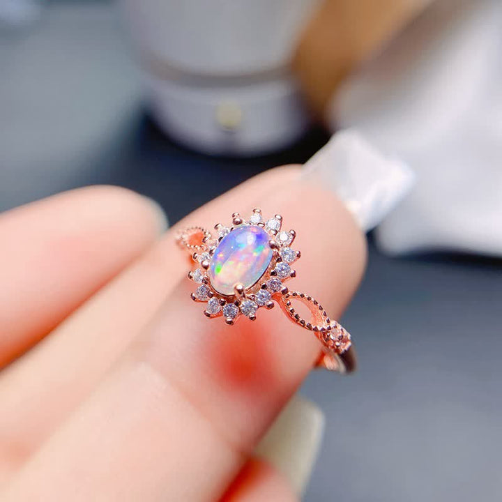 Anillo de girasol con circonita blanca y ópalo natural de Olivenorma