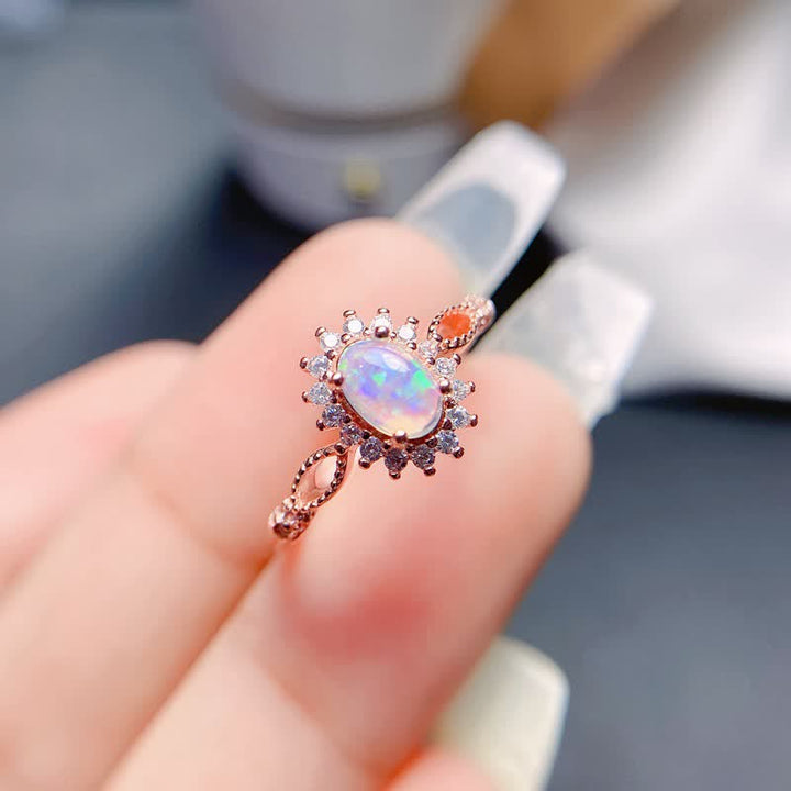Anillo de girasol con circonita blanca y ópalo natural de Olivenorma