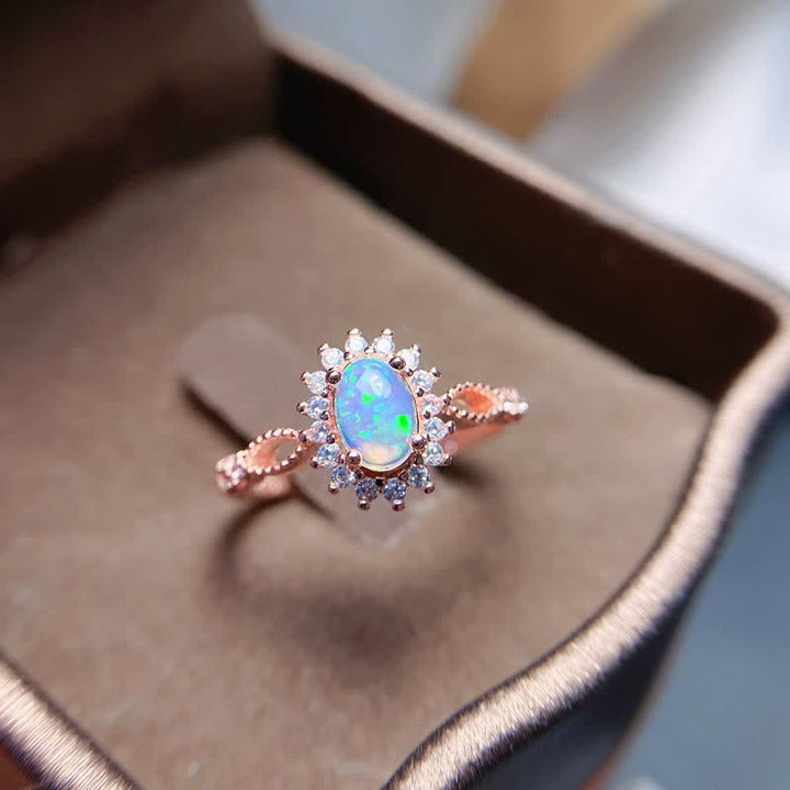 Anillo de girasol con circonita blanca y ópalo natural de Olivenorma