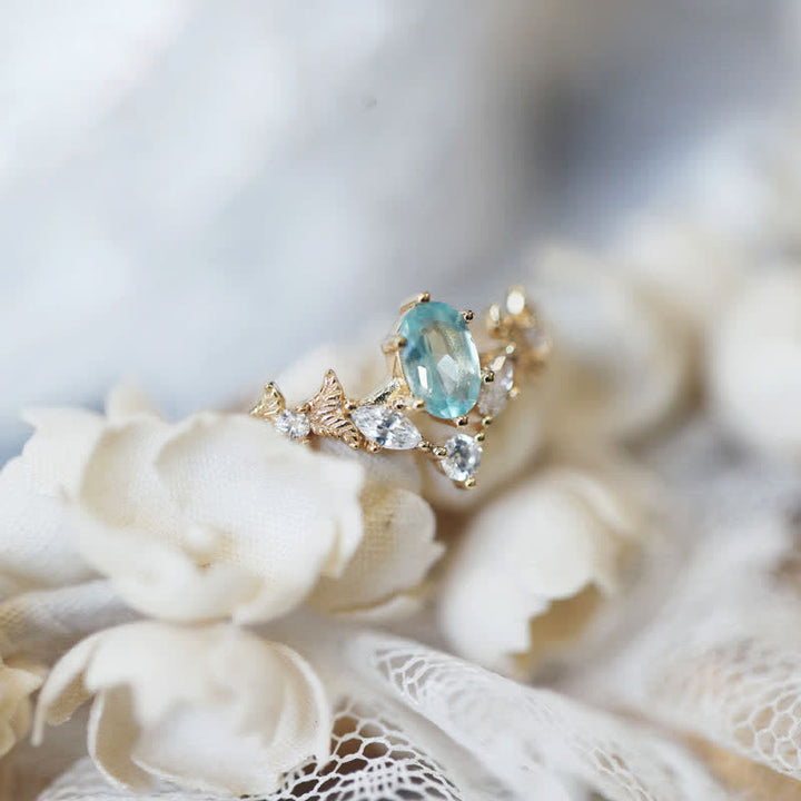 Anillo con forma de corona de circonita blanca y aguamarina de Olivenorma