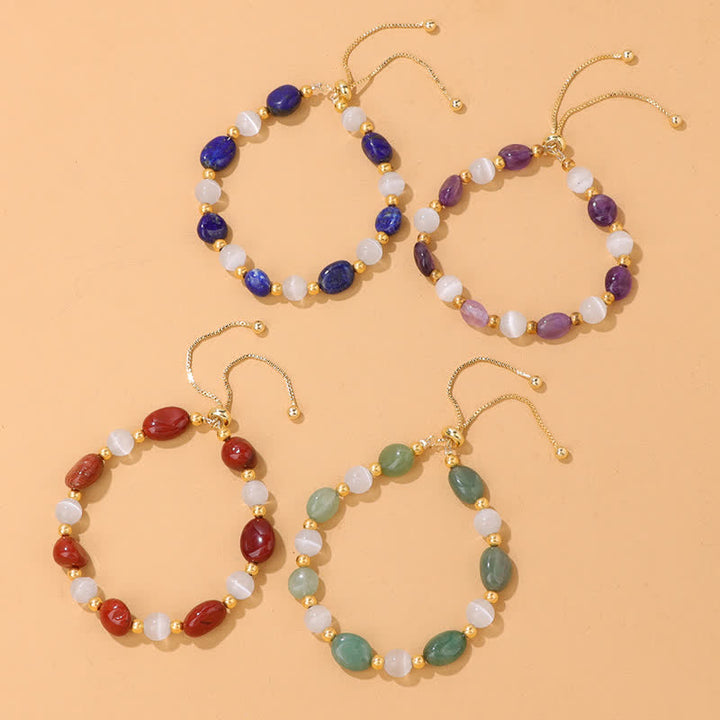 Pulsera de cuentas de cristal irregulares naturales con piedra de ojo de gato de Olivenorma 