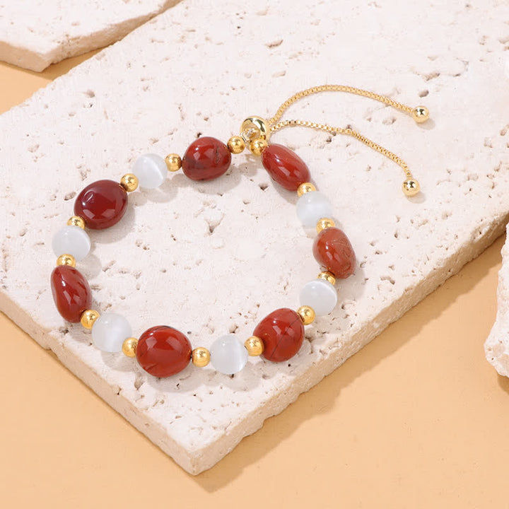 Pulsera de cuentas de cristal irregulares naturales con piedra de ojo de gato de Olivenorma 