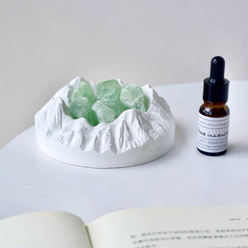 Vela de aromaterapia con cristales curativos en forma de montaña de Olivenorma