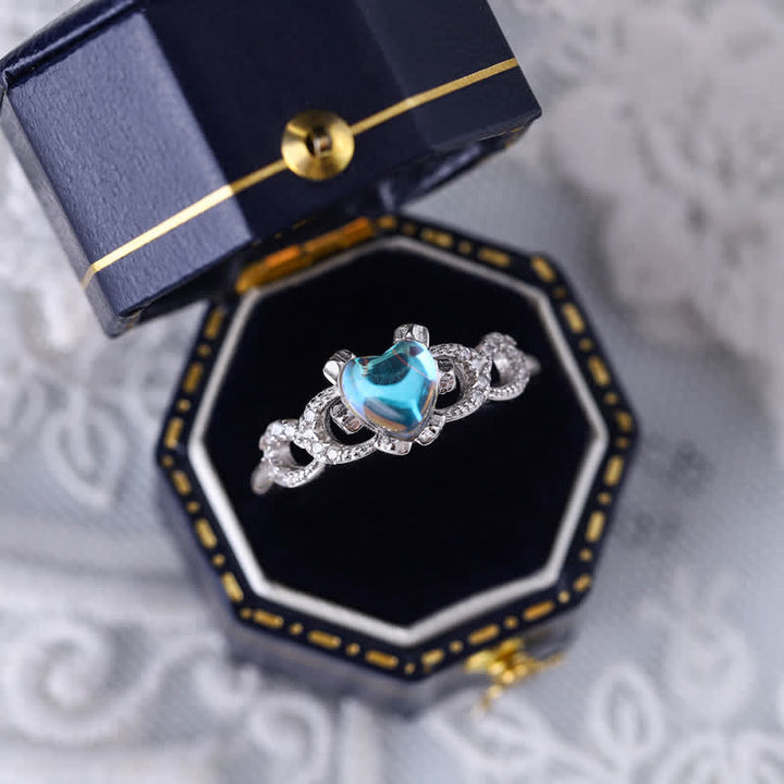 Anillo ajustable abierto con forma de corazón y piedra lunar en plata esterlina de Olivenorma